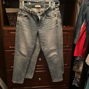 Two pairs of moussy vintage denim. One cropped and one full length. Size 27